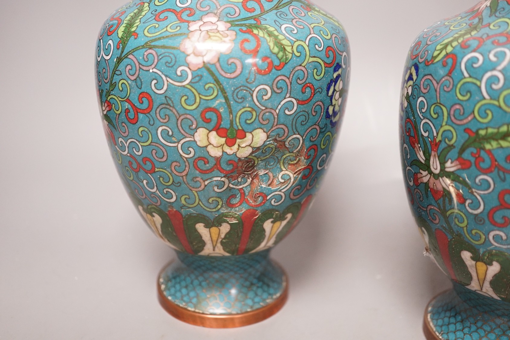 A pair of early 20th century Chinese cloisonné enamel vases - 25cm tall